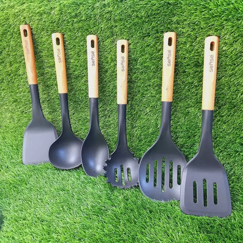 سرویس کفگیر ملاقه سیلیکونی دسته چوبی(پایه استیل)